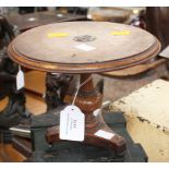 A small, table, possibly all window exhibit of an early 19th century.