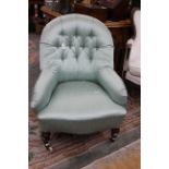 A Victorian green upholstered nursing chair