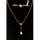 An Edwardian opal pendant with round opal with a suspending double bar drop with further oval opal,