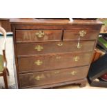 A George III mahogany chest of drawers, comprising two short over three long graduated drawers,