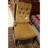 A mid Victorian mahogany deep buttoned back chair,