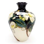 A Moorcroft limited edition vase 49/50 in the Camilia pattern, designed and signed by Nicola Slaney,