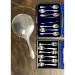 Two cased sets of six silver teaspoons, hallmarked Birmingham 1899 and Sheffield 1913 respectively,
