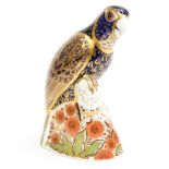 A Royal Crown Derby 'Bronze Winged Parrot' paperweight, 1st quality with gold stopper,