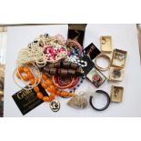 A bag of costume jewellery to include silver items