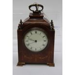 A French mahogany mantle clock inlaid with satinwood in swags pattern, Roman numerals to dial,