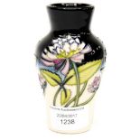 A Moorcroft vase in the Trefoil pattern, designed by Nicola Slaney, ahspe 23/4,