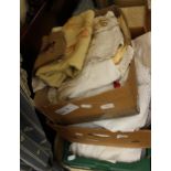 Three boxes of assorted table linen