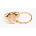 One 9ct gold oval signet ring engraved, size K1/2, one 22ct band, approx 1.