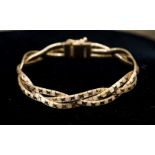 A Danish 18ct gold woven bracelet, bright cut engraved,