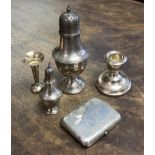 Five pieces of silver comprising a cigarette case, London 1895, sugar sifter, Birmingham 1911,
