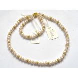 A Freshwater pearl necklace and bracelet set,