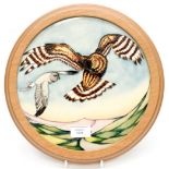 A Moorcroft limited edition circular framed plaque for the RSPB in the Sky Dancer pattern, No.