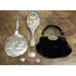 A silver backed brush and mirror set Birmingham 1906, and 1902, with a silver whiskey bottle label,