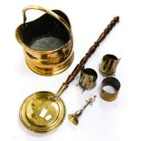 A brass 19th Century coal scuttle, a brass warming pan,