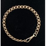 A 9ct gold roller link bracelet with toggle fastener