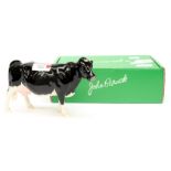 A Beswick figure of a Holstein Fresian cow, with box,