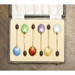 A boxed set of six silver and multi coloured enamelled teaspoons 1955