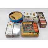 Five tins of cigarette cards Castella, cigar cards and tea cards,