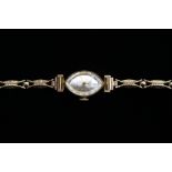 A ladies 9ct gold wristwatch