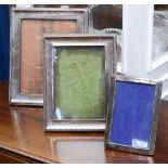 Three silver picture frames