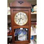 A 1930s wall clock,