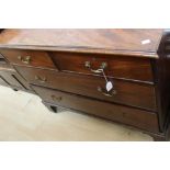 A George III mahogany chest of drawers, comprising two short over two long graduated drawers,