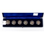 Box of silver buttons