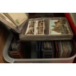 A box containing four albums of postcards, approx. 400, Edwardian and later.