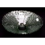 An Art Deco green tinted pressed glass fruit bowl of rusticated form,