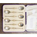 A boxed set of replica Coronation spoons,