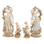 A pair of late 19th Century Continental bisque figures of lady and gentlemen;