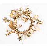 A gold charm bracelet with a variety of 9ct gold charms (osme links on the bracelet marked rolled