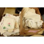 Three boxes of assorted table linen