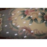 A large Chinese rose patterned woollen carpet,