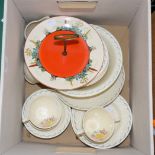 A collection of Susie Cooper Art Deco tea and dessert wares, comprising six cups and saucers,