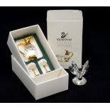 Swarovski crystal memories, comprising miniature ewer and glasses, plus butterfly,