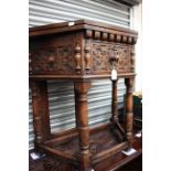 A Jacobean style table, oak joined Credence table with a folding top,