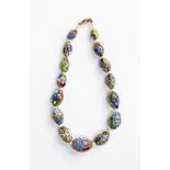 A graduating Murano multi coloured glass bead necklace