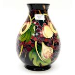 A Moorcroft vase in the Queens Choice pattern, designed by Emma Bossons, dated 2000, shape 7/10,