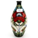 A Moorcroft Trial vase in a Poppy pattern, dated 18.11.