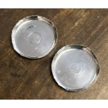 Two silver trinket dishes, with coins to centre, London 1920, maker Thomas Rawlings,