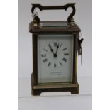 An early 20th Century brass carriage timepiece retailed by J.W.