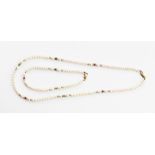 A pearl and 9ct gold necklace and bracelet