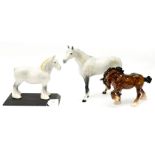 A Beswick shire horse trotting 'Bay' , a bay horse swishing tail,