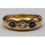 An 18ct gold sapphire and diamond ring,