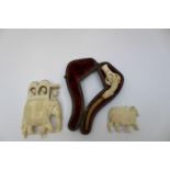 An early 20th Century Indian ivory pipe and carved animals (3)