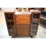 An early 20th Century oak bureau bookcase,