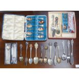 A collection of decorative spoons etc