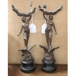 A pair of French 19th century spelter statuette's mounted on plinths